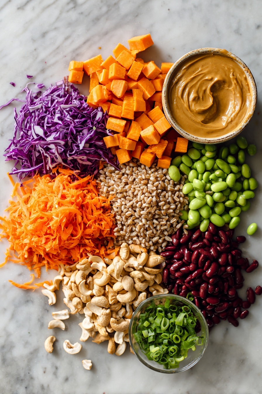 Flat lay of uncooked pearled farro grains, bright orange diced roasted sweet potato cubes, vibrant shredded red cabbage, thin shredded orange carrots, fresh chopped green onions, handfuls of shelled green edamame, glossy rinsed red adzuki beans, and a small mound of roasted cashew pieces, alongside a smooth pool of creamy peanut butter mixed with a touch of maple syrup and fresh lime juice, all beautifully arranged with pops of color and texture, placed on a white marble surface, photo taken with an iphone --ar 2:3 --v 7