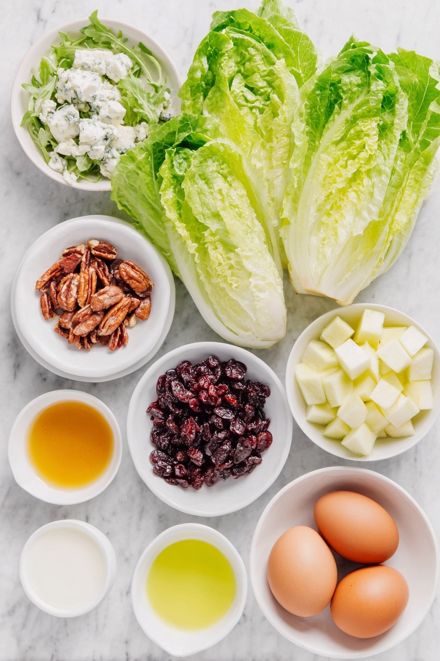 Flat lay of eight large fresh Romaine lettuce leaves, a handful of vibrant green baby rocket leaves, a small mound of deep red dried cranberries, a neat pile of glossy candied almonds, a wedge of creamy blue cheese with visible veins, a small white ceramic bowl filled with cubed fresh apple, a small white bowl containing smooth golden honey, another small white bowl with bright yellow Dijon mustard, a small white bowl of clear red wine vinegar, a small white bowl of pale yellow lemon juice, a small white bowl filled with rich green olive oil, and two whole uncracked brown eggs, arranged in perfect symmetry on a clean white ceramic plate, placed on a clean white marble surface, soft natural light, photo taken with an iPhone, professional food photography style, fresh ingredients, white ceramic bowls, no bottles, no duplicates, no utensils, no packaging --ar 2:3 --v 7 --p m7354615311229779997