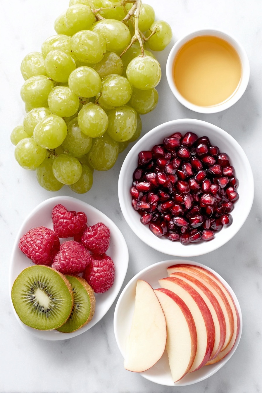 Flat lay of fresh green grapes on the vine, a sliced bright red Cosmic Crisp apple, a sliced tart green Granny Smith apple, plump red grapes, ruby red pomegranate arils in a small white bowl, peeled and halved kiwi slices, a small white bowl with golden honey, a small white bowl with fresh lime juice, and a pile of ripe red raspberries, all arranged with perfect symmetry on simple white ceramic dishes, placed on a clean white marble surface, soft natural light, photo taken with an iPhone, professional food photography style, fresh ingredients, white ceramic bowls, no bottles, no duplicates, no utensils, no packaging --ar 2:3 --v 7 --p m7354615311229779997