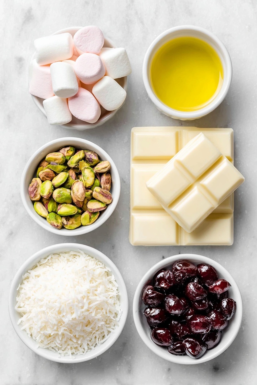 Flat lay of a simple white ceramic bowl of smooth white chocolate discs, a small white bowl of clear golden grapeseed oil, a pile of fresh soft white and pink marshmallows (some cut in half), a small white bowl filled with bright green toasted pistachios, a small white bowl of glossy deep red glacé cherries, and a small white bowl heaped with fine unsweetened desiccated coconut, all arranged with perfect symmetry and balanced proportions, placed on a clean white marble surface, soft natural light, photo taken with an iPhone, professional food photography style, fresh ingredients, white ceramic bowls, no bottles, no duplicates, no utensils, no packaging --ar 2:3 --v 7 --p m7354615311229779997